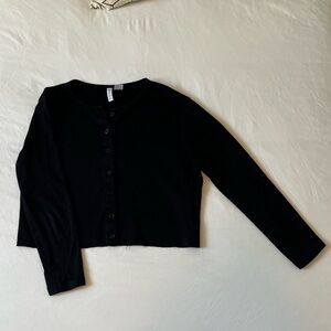 Cropped black sweater. Size large. Runs small